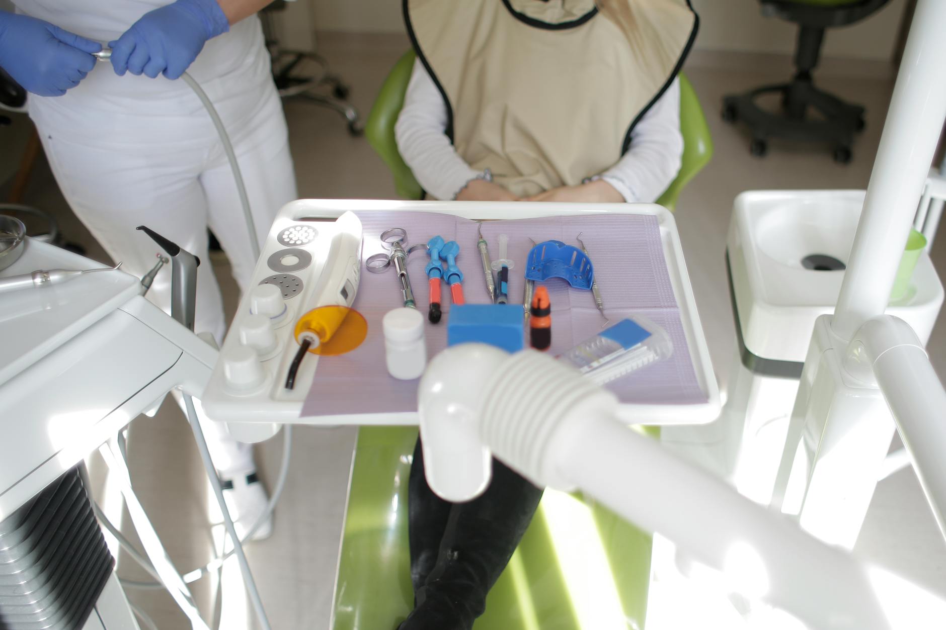 person sitting on dental chair